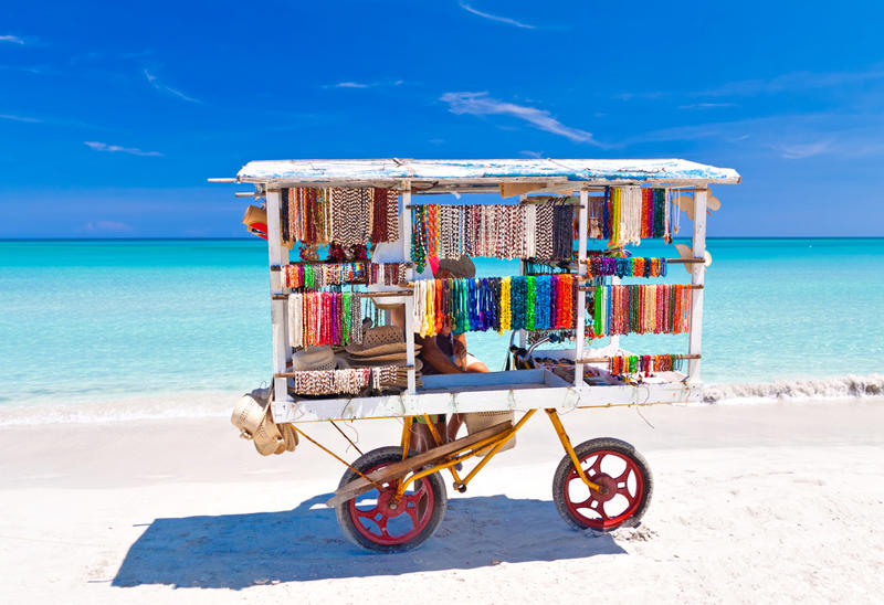 Cart selling typical souvenirs on the beautiful cuban beach of Varadero